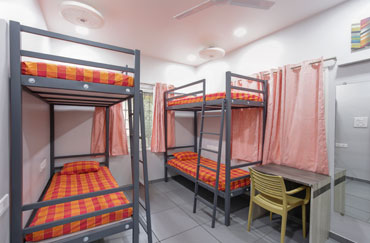 Girls hostel with four sharing rooms facility, Working womens PG in pune with four sharing rooms